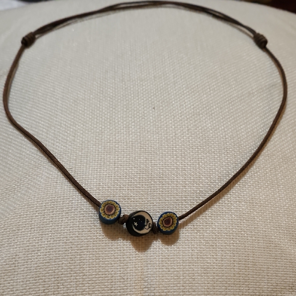 Adjustable Brown Cord Necklace with Daisy and Moon Charms